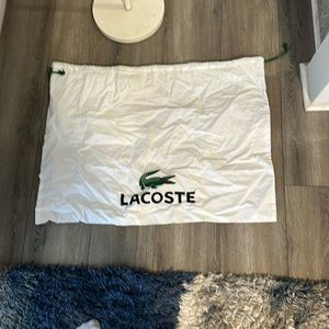 Lacoste 2x2.5 foot duster bag with draw stings
